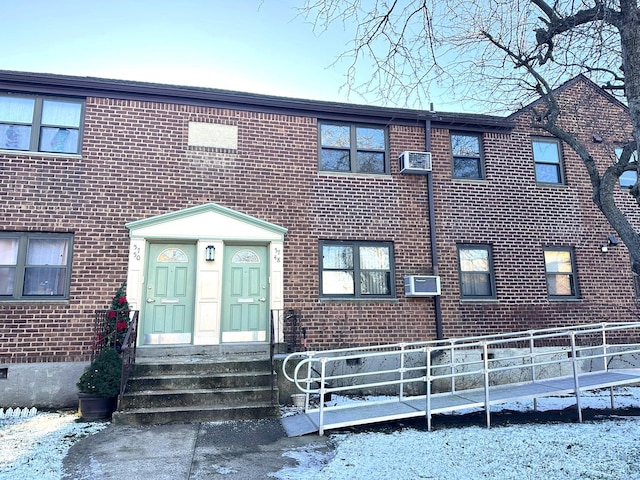 view of snow covered house