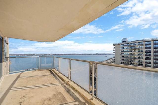 balcony featuring a water view