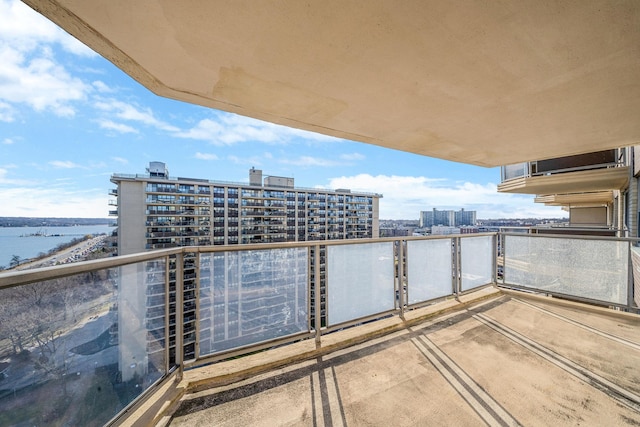 balcony featuring a water view