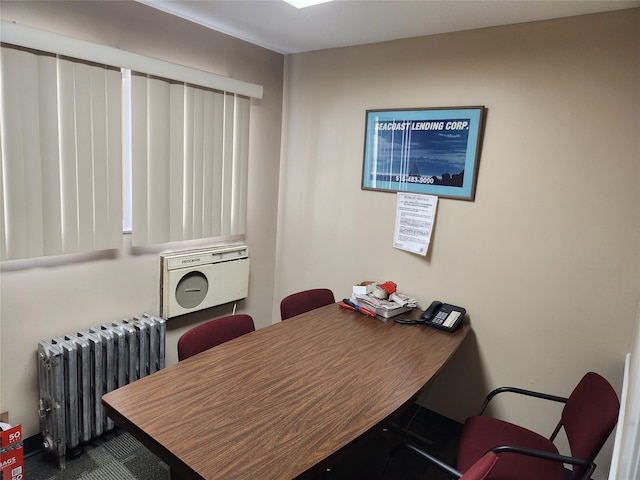 office area featuring radiator heating unit