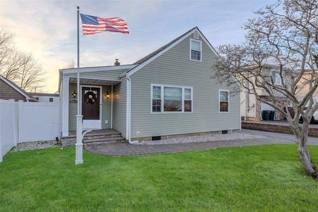 view of front of house with a lawn