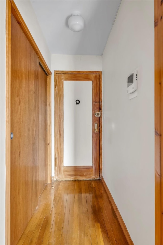 corridor featuring light wood-type flooring