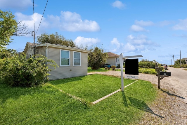 exterior space with a lawn