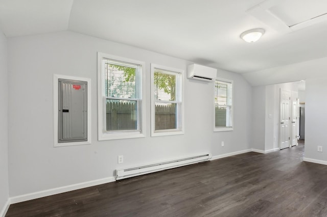 empty room with dark hardwood / wood-style flooring, vaulted ceiling, a wall mounted AC, a baseboard heating unit, and electric panel