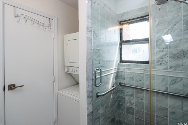 bathroom featuring a shower with shower door