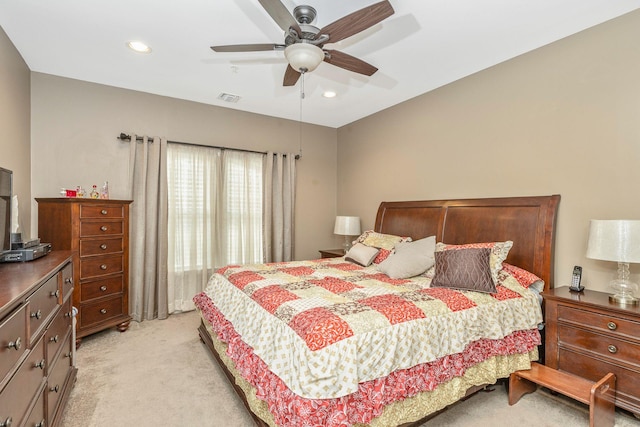 carpeted bedroom featuring ceiling fan