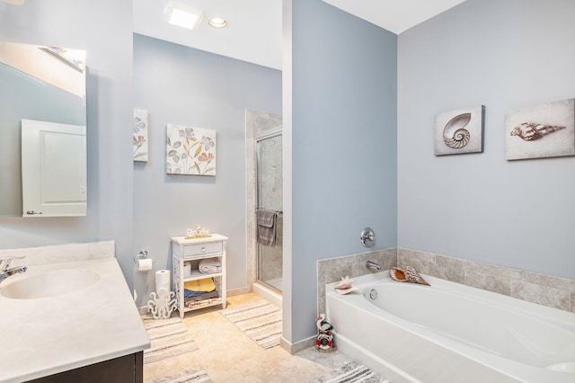 bathroom featuring vanity, tile patterned flooring, and shower with separate bathtub