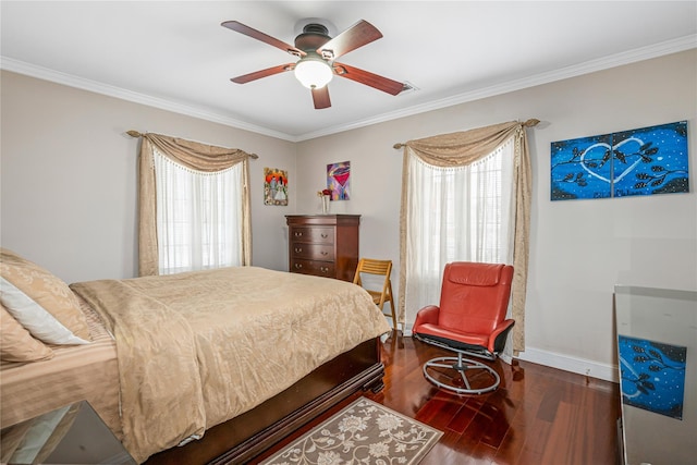 bedroom featuring multiple windows, dark hardwood / wood-style floors, ceiling fan, and crown molding