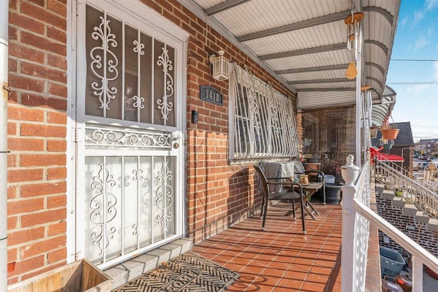 entrance to property with covered porch