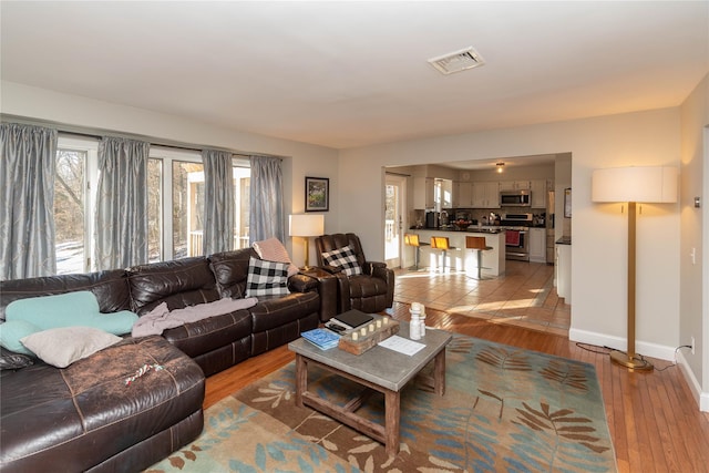 living room with light wood-type flooring