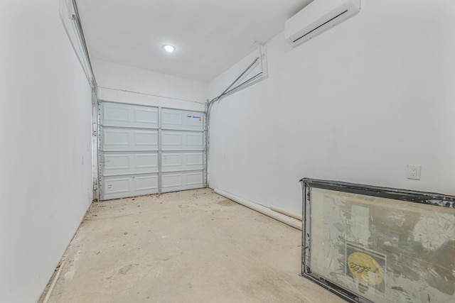 garage featuring a wall mounted air conditioner