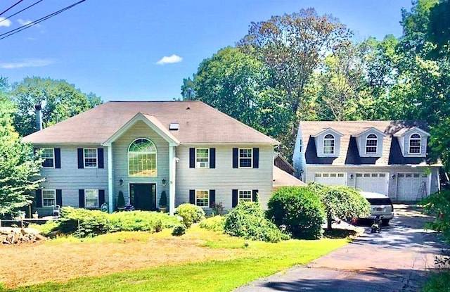 colonial house featuring a garage