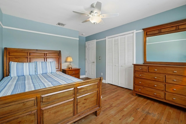 bedroom featuring light wood-type flooring and ceiling fan