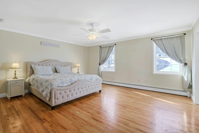 bedroom with wood-type flooring, a baseboard radiator, ceiling fan, and crown molding