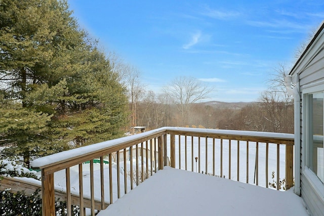 view of snow covered deck