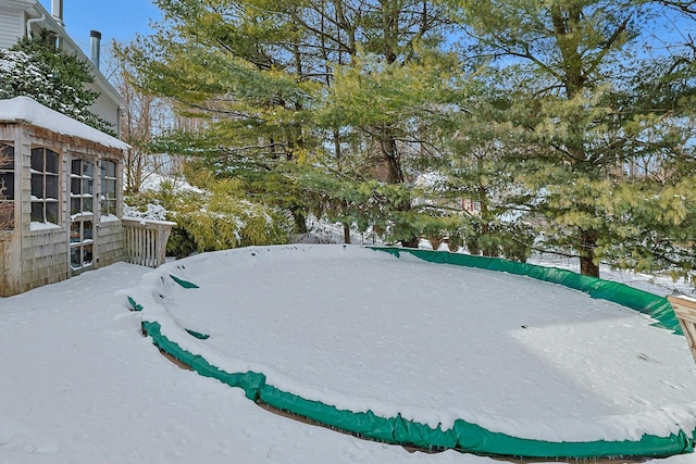 view of yard covered in snow