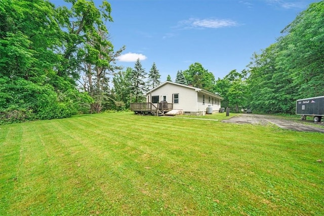 view of yard with a deck