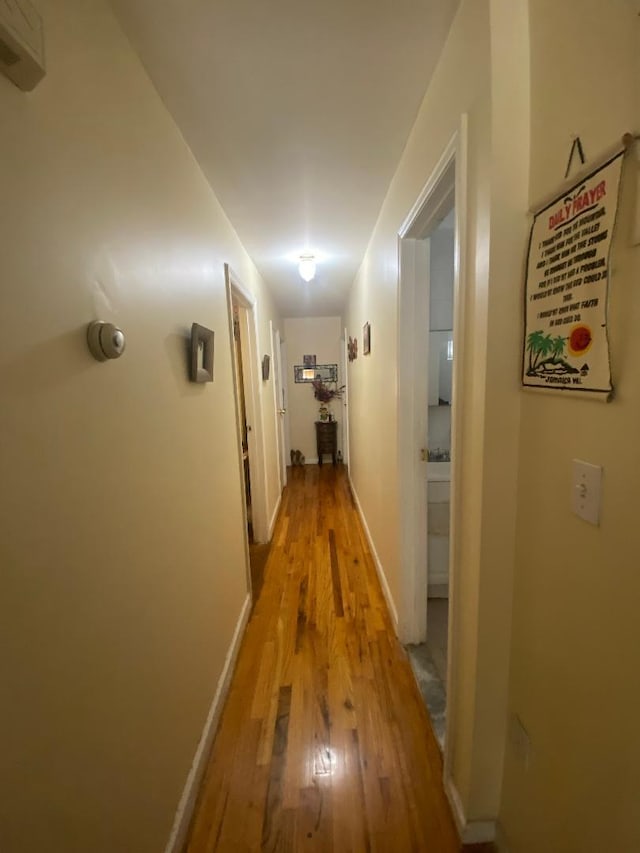 hall featuring light hardwood / wood-style flooring