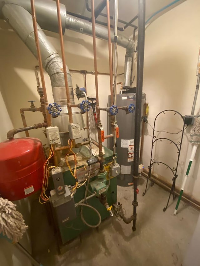 utility room with gas water heater