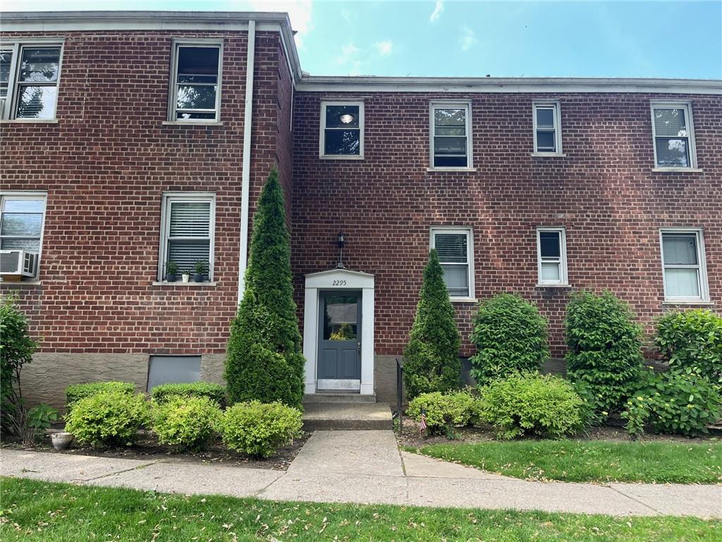 view of front of property with cooling unit