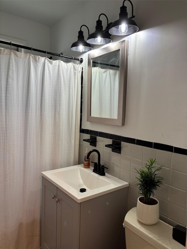 2295 Palmer Ave Unit 1P, New Rochelle, NY 10801 - bathroom with vanity, toilet, and tile walls