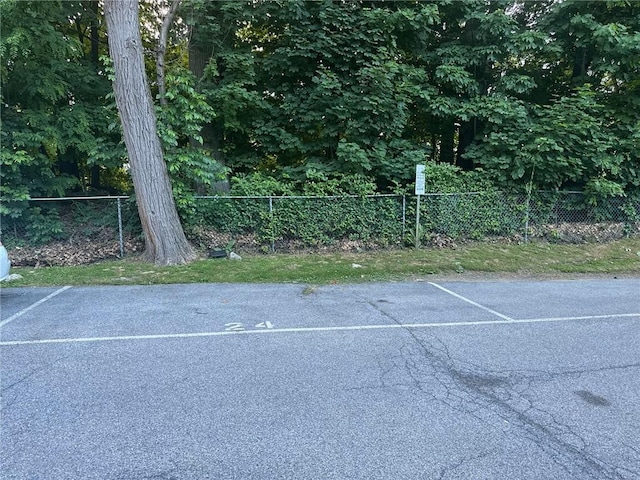 2295 Palmer Ave Unit 1P, New Rochelle, NY 10801 - uncovered parking lot featuring a tennis court