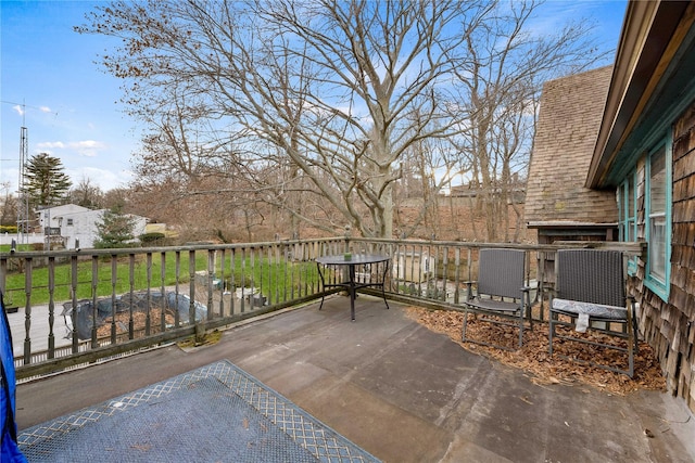 view of patio with a balcony