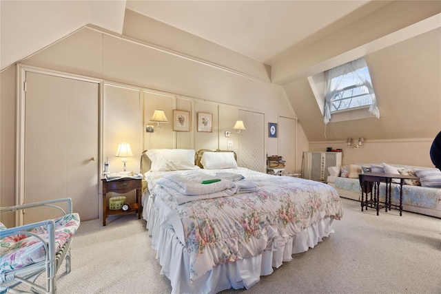 carpeted bedroom featuring vaulted ceiling