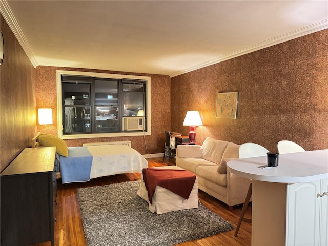 interior space featuring dark hardwood / wood-style floors and ornamental molding