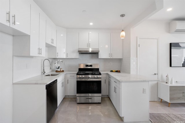 kitchen with gas range, sink, decorative light fixtures, white cabinets, and black dishwasher