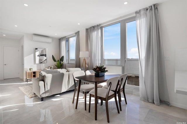 dining room featuring a wall mounted air conditioner