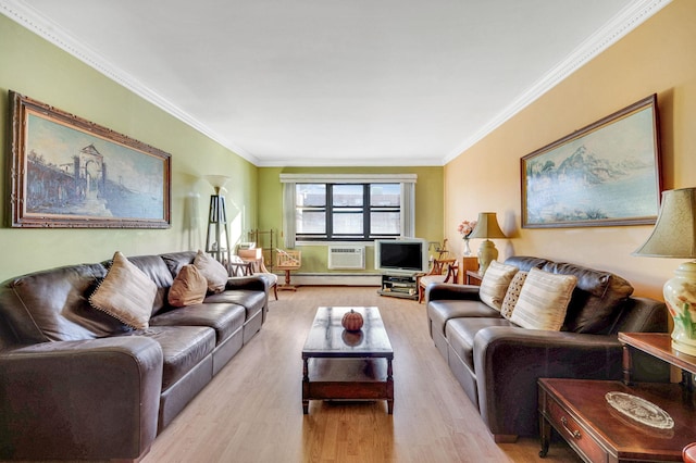 living room featuring light wood-type flooring and ornamental molding