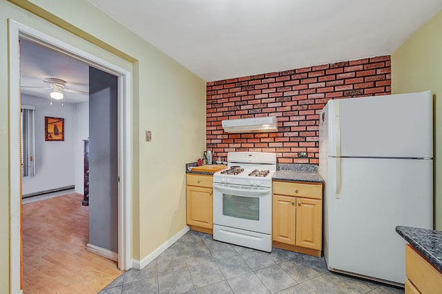 kitchen featuring light brown cabinetry, white appliances, and light tile patterned floors