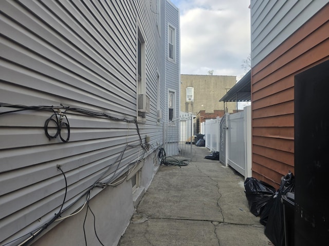 view of side of home featuring a patio area