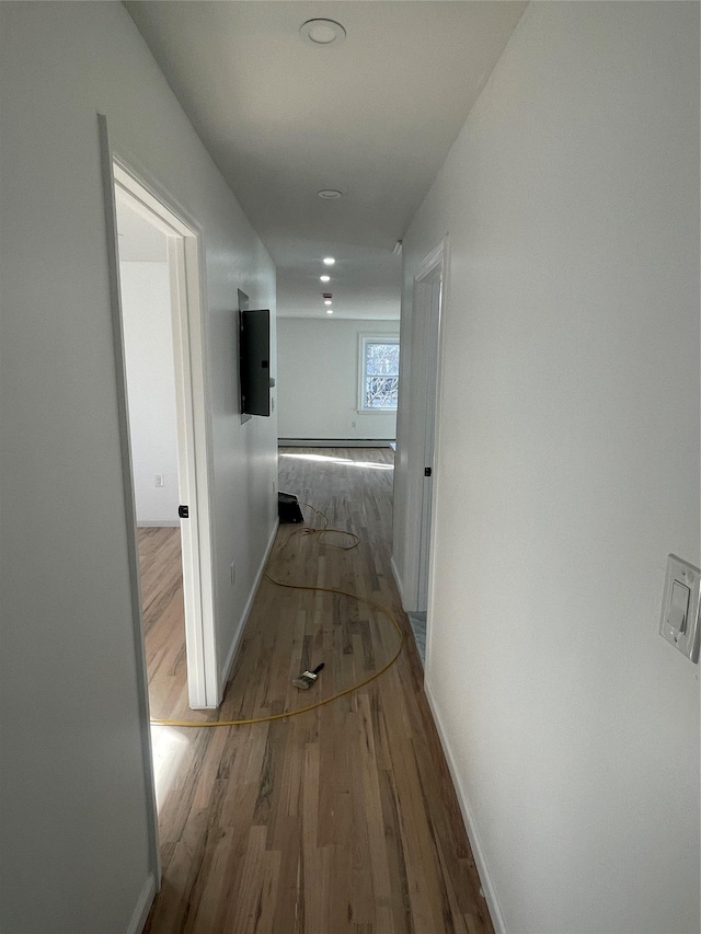 hallway featuring light hardwood / wood-style flooring