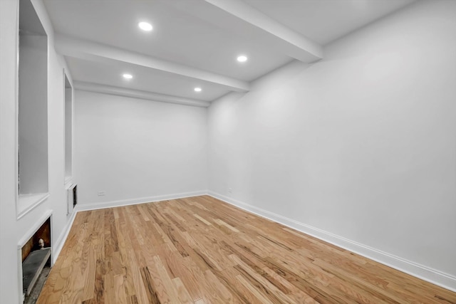 basement featuring hardwood / wood-style flooring