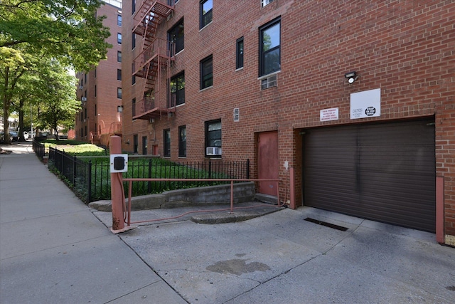 view of building exterior with cooling unit