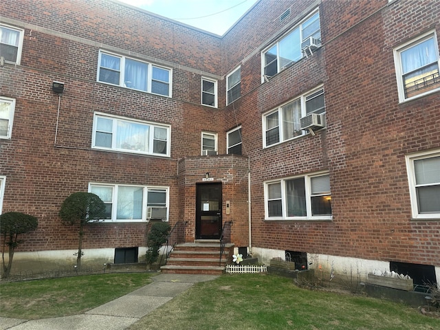 view of building exterior featuring cooling unit