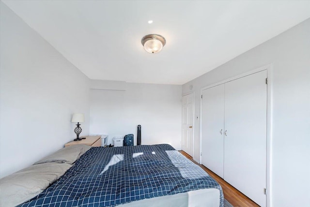 bedroom featuring a closet and hardwood / wood-style floors