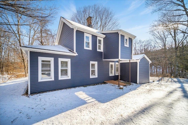 view of snow covered property