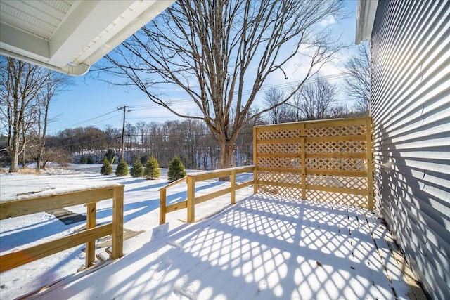 view of snow covered deck