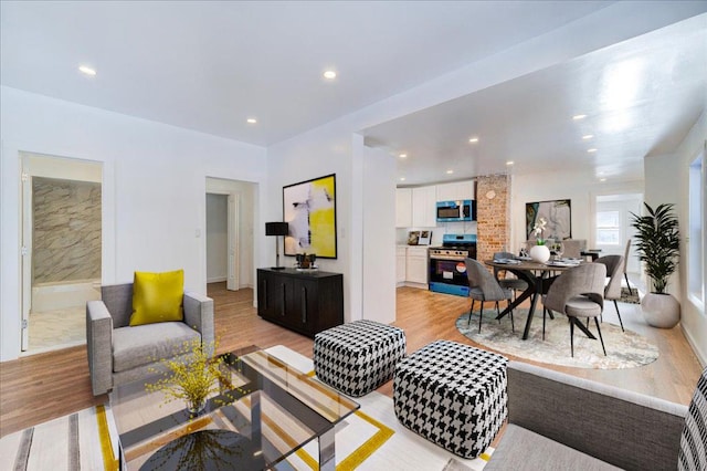 living room with light hardwood / wood-style floors