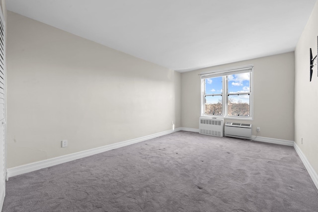 carpeted spare room with radiator