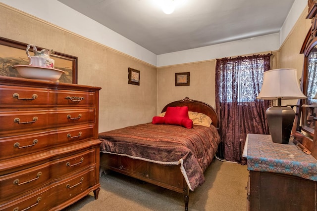 bedroom with light colored carpet