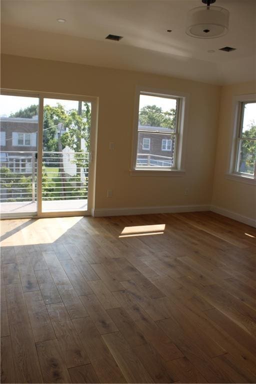 empty room featuring dark wood-type flooring