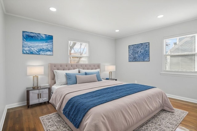 bedroom featuring dark hardwood / wood-style floors and ornamental molding