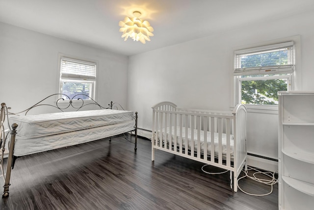 bedroom featuring dark hardwood / wood-style floors