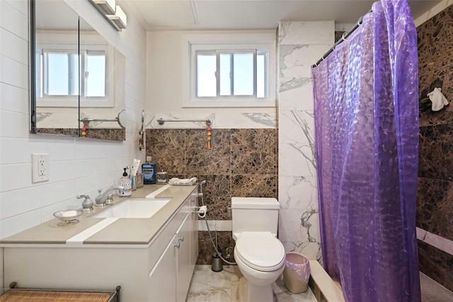 full bath featuring a shower with curtain, a healthy amount of sunlight, tile walls, and toilet