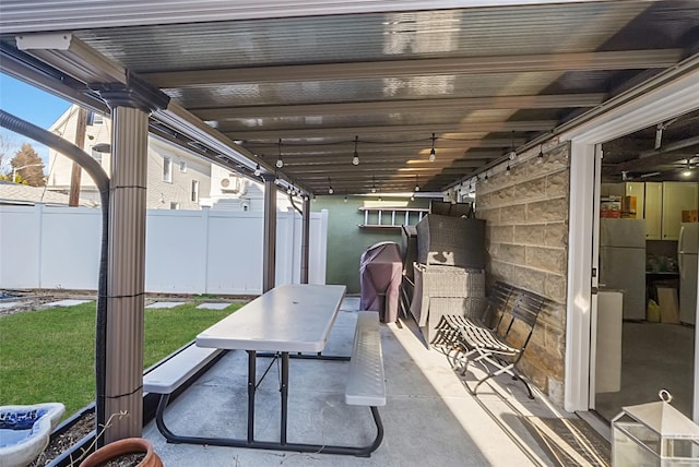 view of patio with fence