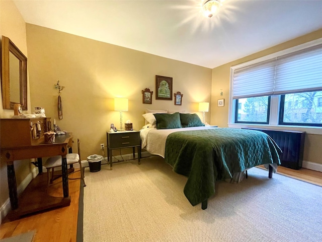 bedroom with radiator heating unit